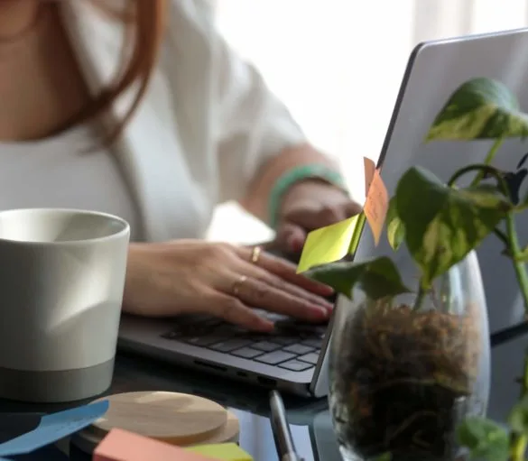 Marketing professional working on laptop