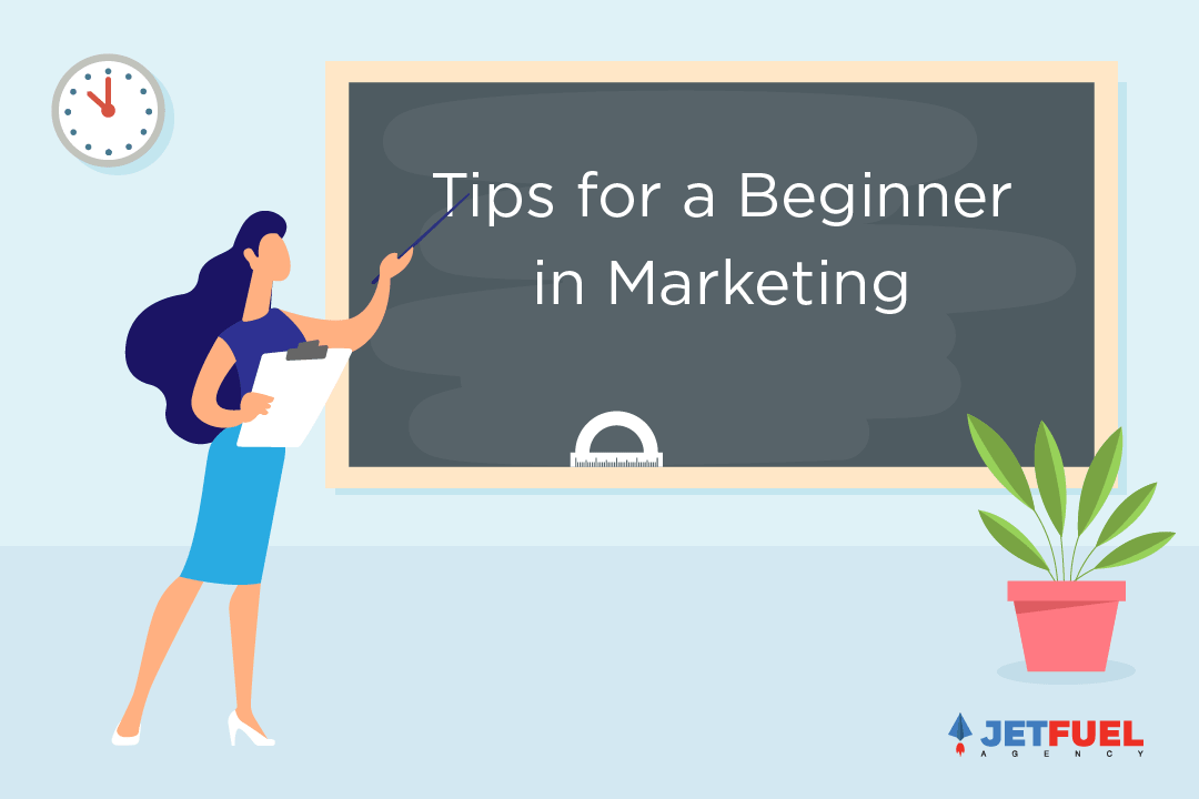 A teacher pointing to "Tips for a beginner in marketing" on a blackboard.